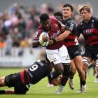 The Highlanders' Timoci Tavatavanawai tries to bust through through the Crusaders defence. Photo:...