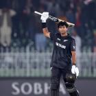 Rachin Ravindra celebrates his century against Bangladesh. Photo: Getty Images 