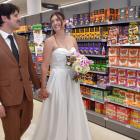 Four years after meeting in aisle one at New World Centre City, newly-weds Jack Brosnahan and...
