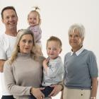 Sam Lee holding Heidi (20 months), Alyse Lee holding Archie (3 and a-half) and Archie's...