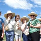 Enjoying an ice cream in the sun at the North Otago A&amp;P Show on Saturday are (from left) Theo...