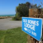 Old Bones Lodge co-owner Grant Abrams erected a sign to direct people straight down Gardiners Rd...