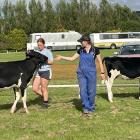 Kate Cummings imparts knowledge to Eva Hellewell-Byars at a Holstein Friesian New Zealand young...