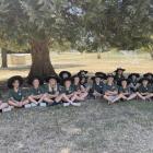 Tarras School pupils enjoy the shade during their sunny lunch break. PHOTO: RAWAN SAADI
