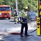 Firefighters at the scene of the crash in Leckhampton Court this morning. Photo: Peter McIntosh 