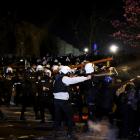 Demonstrators are sprayed during a protest by students against the detention of Istanbul Mayor...