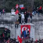 People take part in a protest in Istanbul on the day the city's mayor was jailed. Photo: Reuters