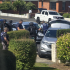 Armed police outside the Taieri Rd property today. Photo: Supplied 