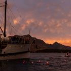 Legend swimmers come off TSS Earnslaw into Lake Wakatipu on Saturday morning. Photo: supplied