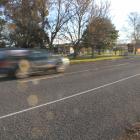 A car travels past Clutha Valley Primary School. PHOTO: HAMISH MACLEAN