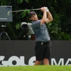 Ben Campbell plays a shot during the second day of the Singapore leg of the LIV Golf League....