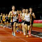 Ethan Smolej during Sam Ruthe’s (black singlet) sub-four minute mile attempt in Auckland. PHOTO:...