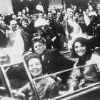 Former US President John F Kennedy (centre), first lady Jacqueline Kennedy (right) and Texas...