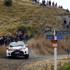 Spectators watch Mike Young at last year’s Otago Rally, near Middlemarch. PHOTO: DAVID THOMSON