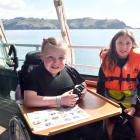 Andersons Bay School classmates Maadi Van Delden (left) and Tayla Donaldson prepare for their...
