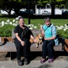 Kelly the dog is back with owner Sally Anderson (right) thanks to a team effort, including from...