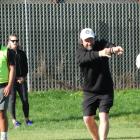 Rugby Bricks founder and coach Peter Breen demonstrates a passing drill during a skills session...