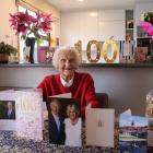 Oamaru resident Barbara Johnston with her suite of centenary birthday cards at her home this week...