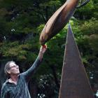 A diving New Zealand falcon, kārearea, created by sculptor Marty Beckwith (pictured), of...