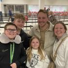 Simon and Lynne Usher, pictured with their children, were awarded just over $18,000 in a Tenancy...