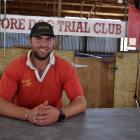 Gore Sheep Dog Trial Club president Tain Laing in a shearing shed on the Grant brothers’ sheep...