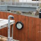 Over the fence abutting the Hillside Rd footpath to the former Dunedin Gasworks is an underground...