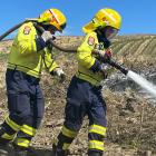 Wānaka Fire Brigade volunteer firefighters Clayton Sargisson (left) and Myah Richards at a...
