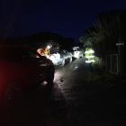 Specialist lines crews arrive in Cliffs Rd. Photo: Ruby Shaw