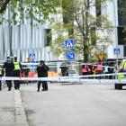 Police at the scene of the shooting at Vaksala Square in Uppsala, Sweden. Photo: TT News Agency...