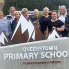 Principal Fiona Cavanagh, fourth from right, with long-serving teachers, from left, Susan...