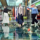 Displaying a rack of clothing in Dunedin’s Wall St Mall yesterday are designers (from left) Tegan...