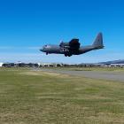 The Royal New Zealand Air Force C-130H Hercules (NZ7001), known as ‘‘Charles’’, lands at Wigram...