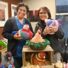 Women Helping Ōtepoti chairwoman Monica Zaini (right) delivers a load of knitted chickens to...