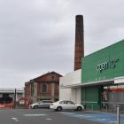 The Dunedin Gasworks Museum chimney stack is right beside the Dunedin South Woolworths...