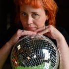 Jenny Duncan, of Pearl Diver, with a small disco ball after their larger one was taken. Photo:...