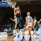 Matt Bardsley grabs the rebound for the Otago Nuggets during their NBL game against the Nelson...