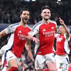 Arsenal goal scorers Mikel Merino and Declan Rice celebrate after Merino's goal during their 3-0...