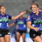 Portia Woodman-Wickliffe of the Blues celebrates her try during tonight's Super Rugby Aupiki...