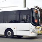 A bus headed for Harington Point on the Otago Peninsula stops outside Bayfield High School,...