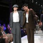 iD International Emerging Designer winner Ciaran Naylor (right) poses with a model during last...
