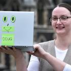 University of Otago student administration team leader Louise Ross with Doug, the Domestic Otago...