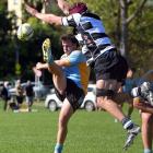 University halfback Brad Campbell clears the ball during a Dunedin division 1 club game against...