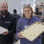 Holding trays of scented shower products are Essentially Tamara co-directors Matt Lamb and Carla...
