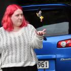 Andersons Bay resident Breeanna Rawlinson with her Mazda Demio which was stolen from outside her...