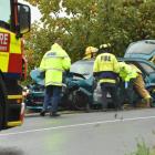 Emergency services at the scene of the Warrender St crash which left a person critically hurt....