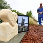 West Harbour Community Board member Jarrod Hodson pays respects to the beloved "Track Cat", who...