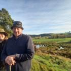 Waikākahi farmer Martin Cochrane, with daughter Jess, alongside a wetland on their farm. PHOTO:...
