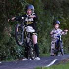Macandrew Bay pupils Jack Mooney, 11, (front) and Connor Blair, 5, try out their school’s new...