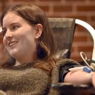 University of Otago microbiology honours student Caitlin Ewenson gives blood at Union Hall...
