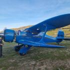 Callum Smith with the Beech D-17S Staggerwing VH-BBL. PHOTO: SUPPLIED